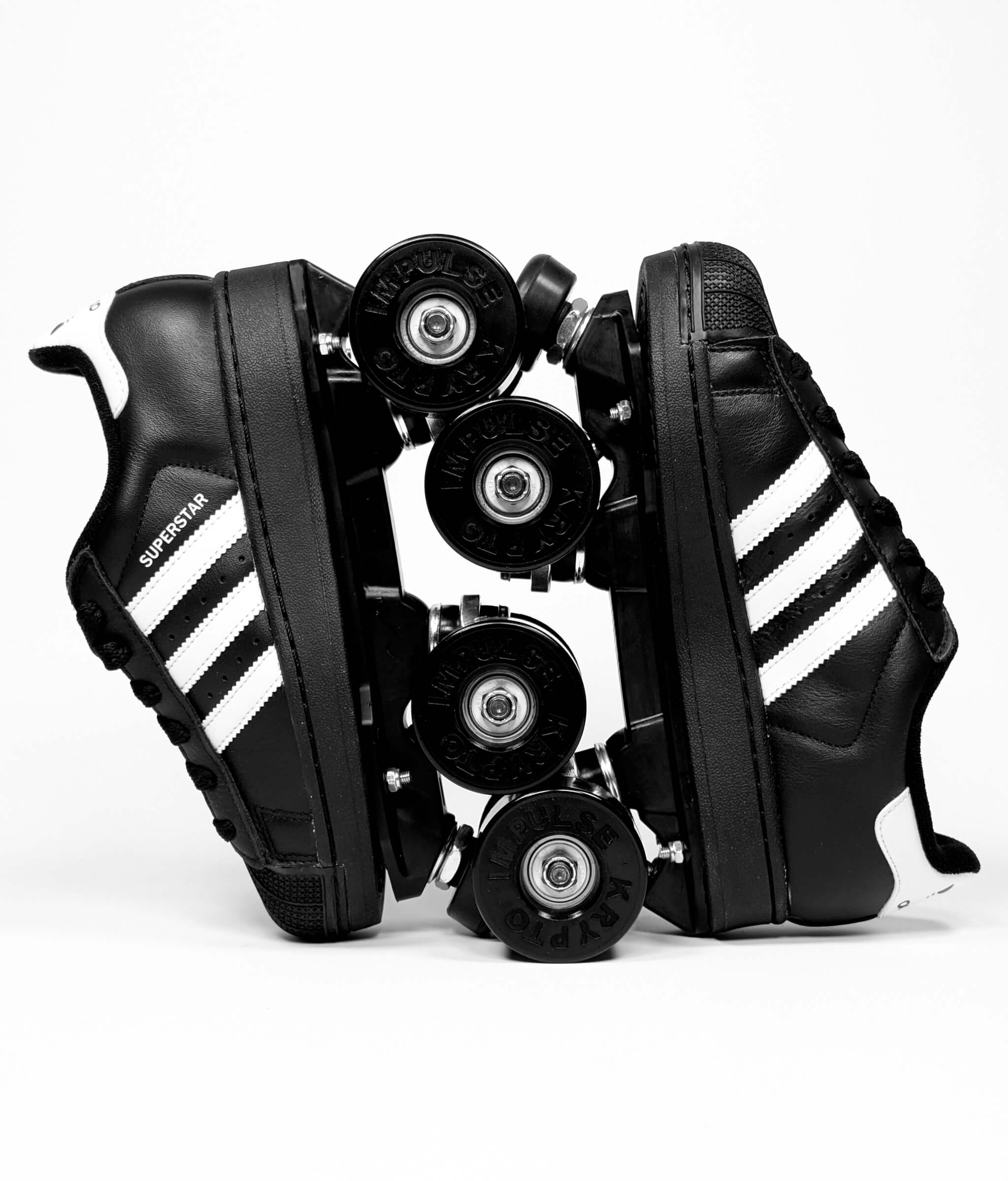 Loumy’s Adidas Superstar roller sneakers in black and white with interlocked wheels