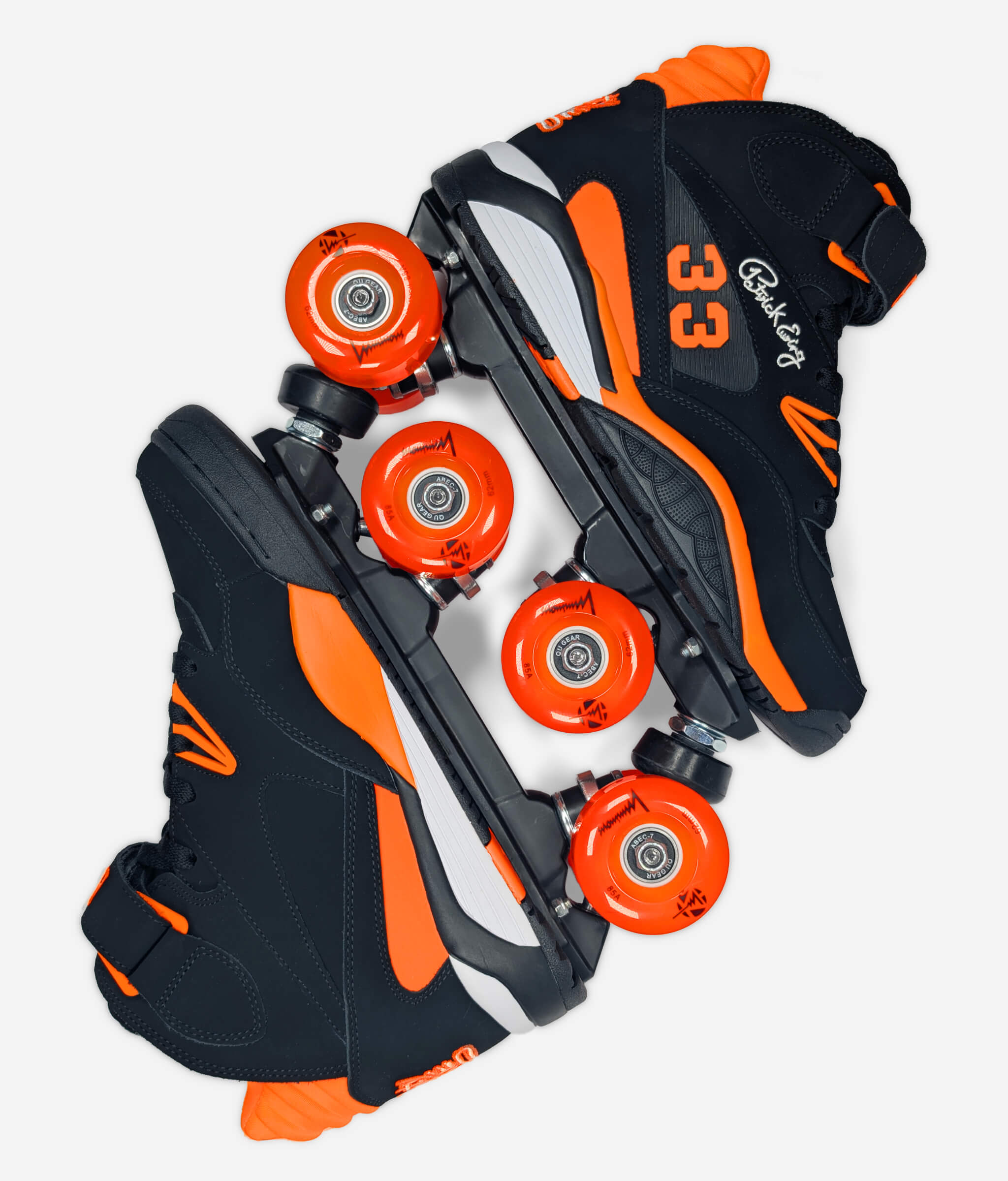 Ewing Kross x Naughty by Nature roller skate sneakers by Loumy's World in black and orange, displayed with wheels interlocked