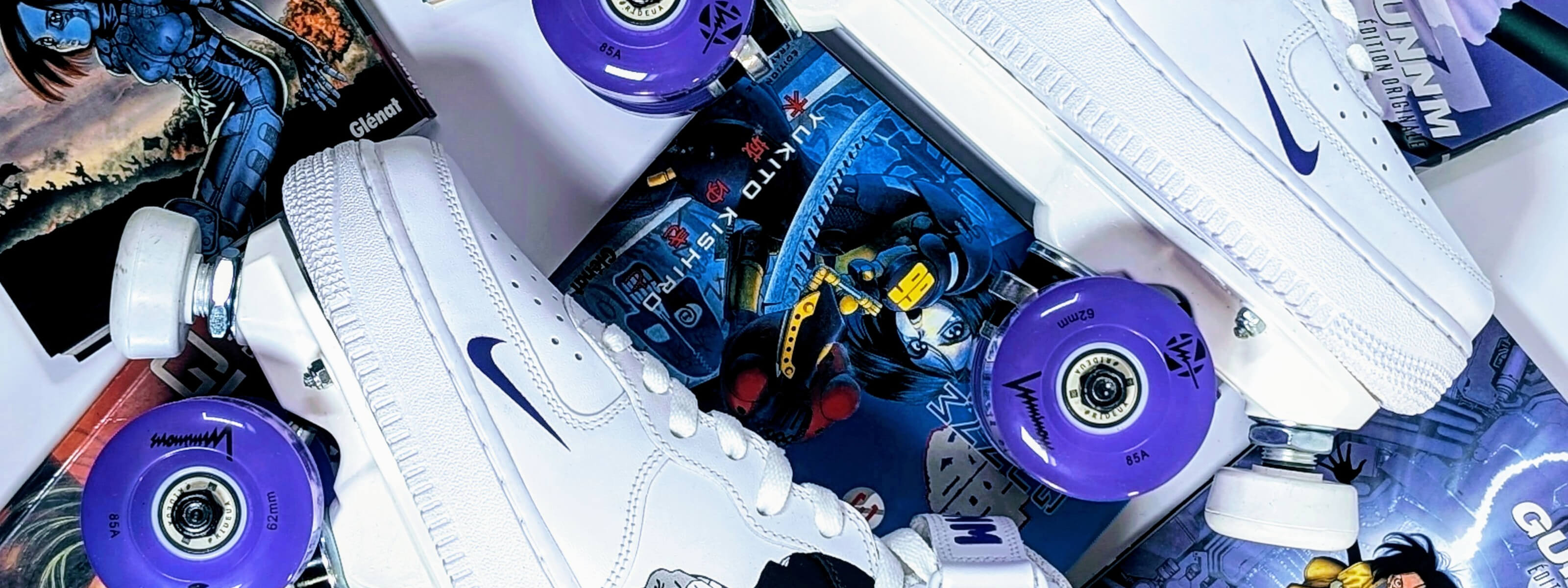 LOUMY x KAZY Gunnm roller sneakers made from Nike Air Force 1 displayed over Gunnm manga volumes