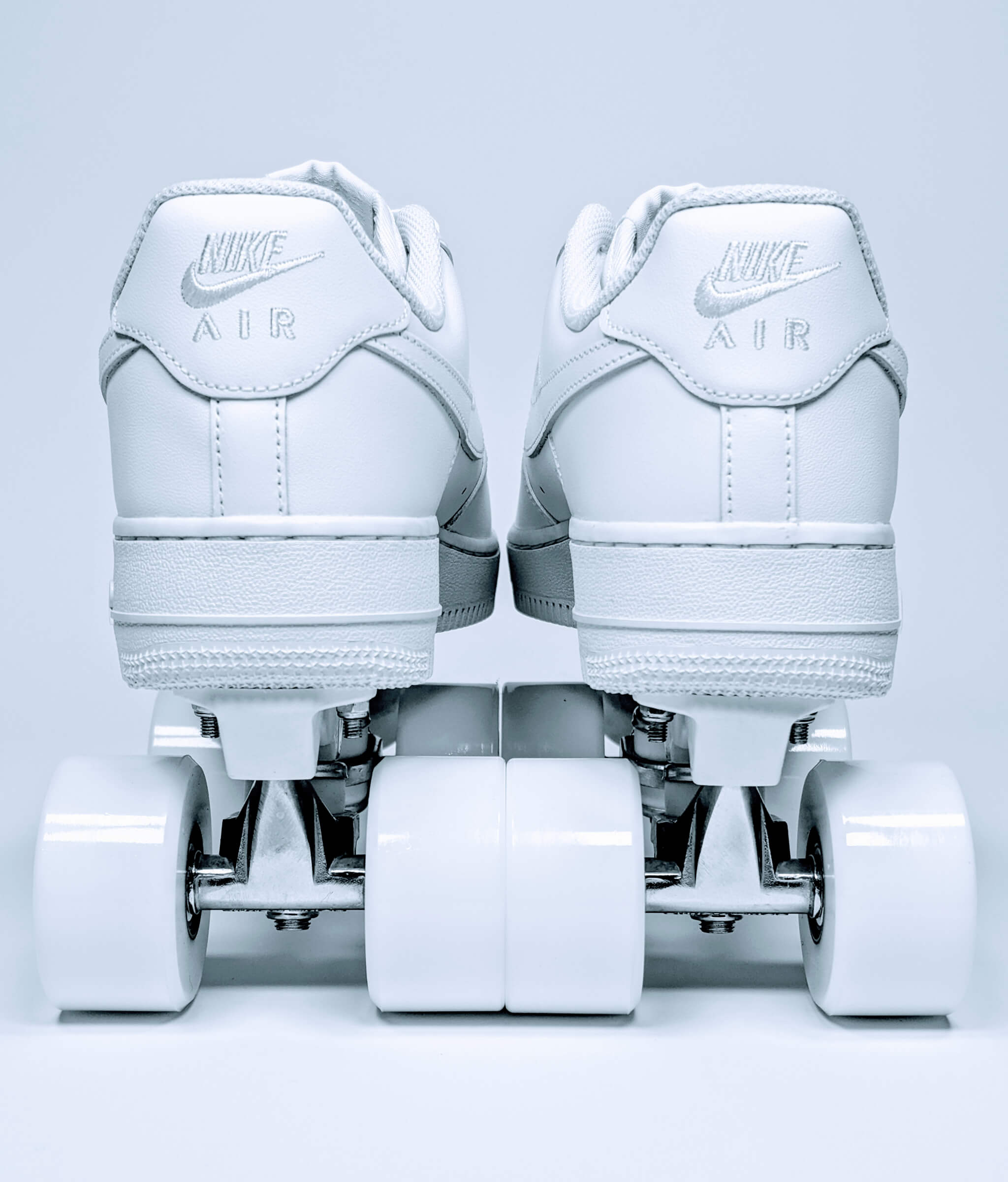 Back view of Loumy's Nike Air Force 1 Low roller sneakers in all white
