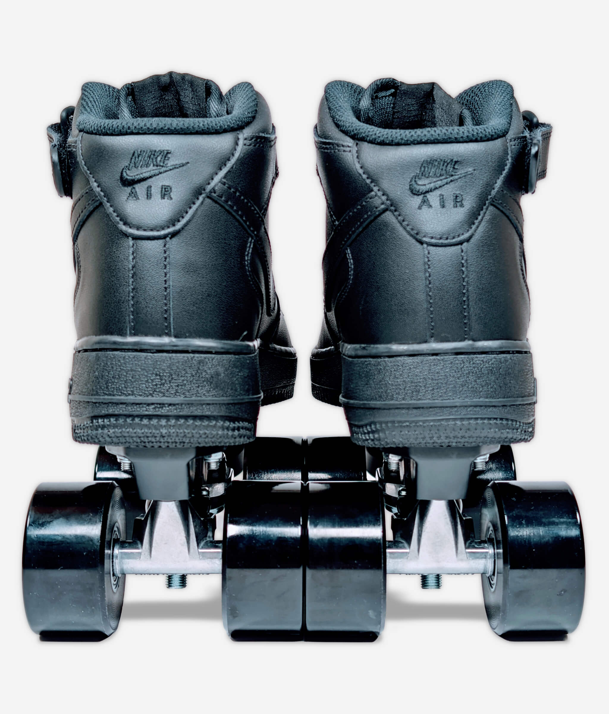 Back view of Loumy's Nike Air Force 1 Mid roller skate sneakers in all black