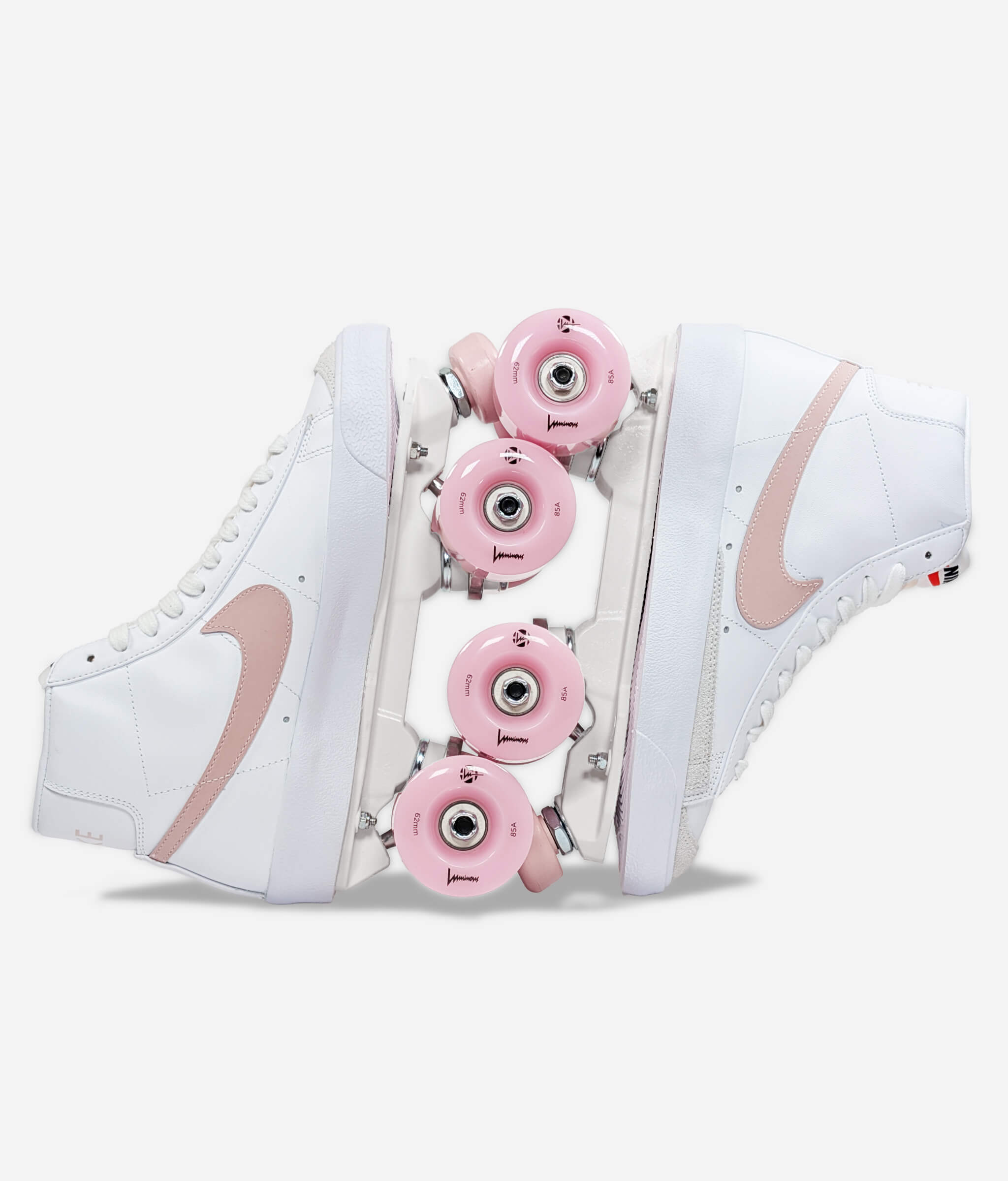 Loumy's Loumynous Blazer roller skate sneakers made from white Nike Blazer Mid ’77 with pink swoosh and glowing pink LED wheels, displayed vertically with interlocked wheels