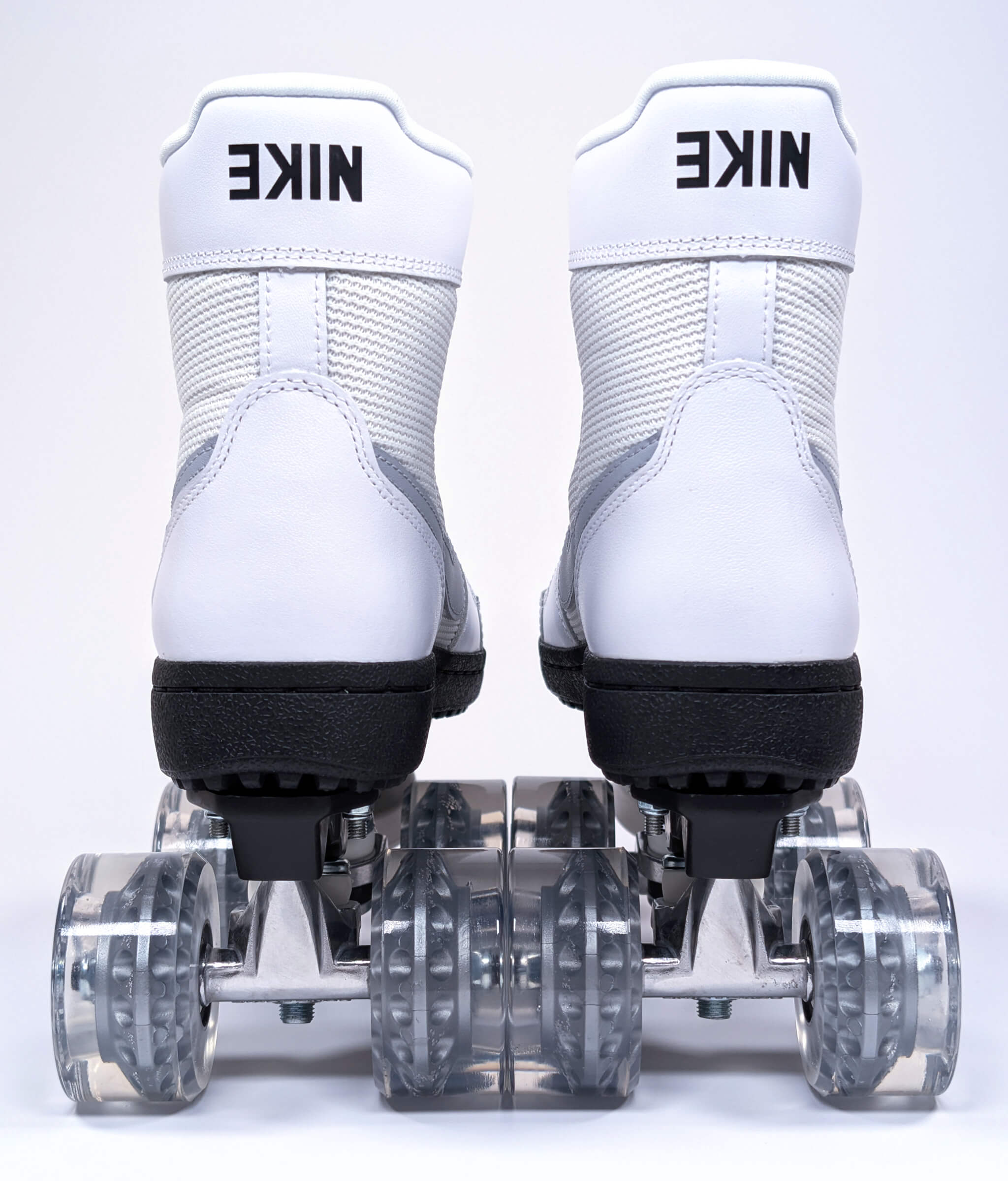 Back view Nike Field General High x Stranger Things roller sneakers by Loumy's World in white, grey and black with upside down Nike logo