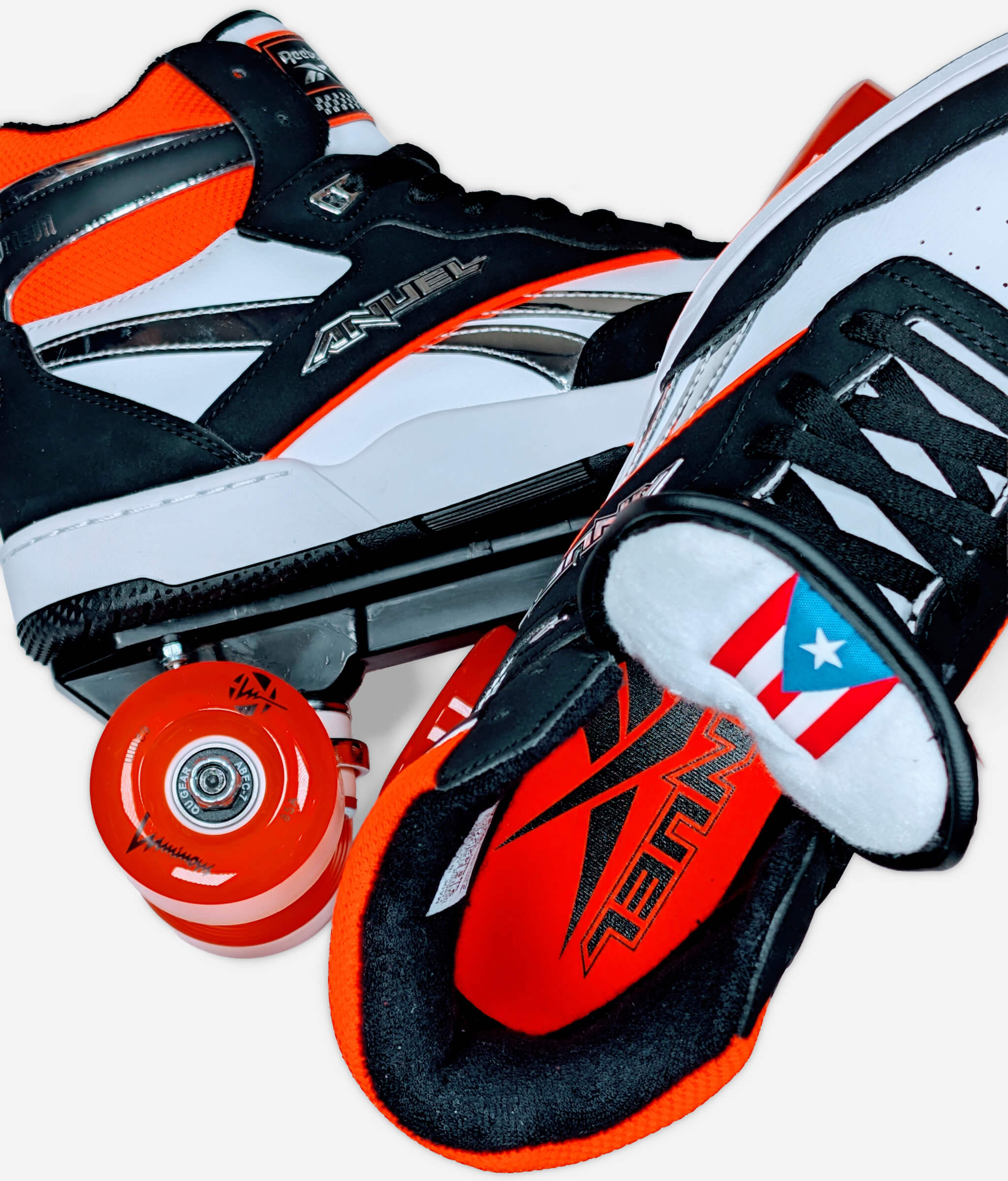 Details of Loumy's Reebok x Anuel AA BB 4000 II Mid roller skate sneakers with the Anuel AA logo and the Puerto Rican flag