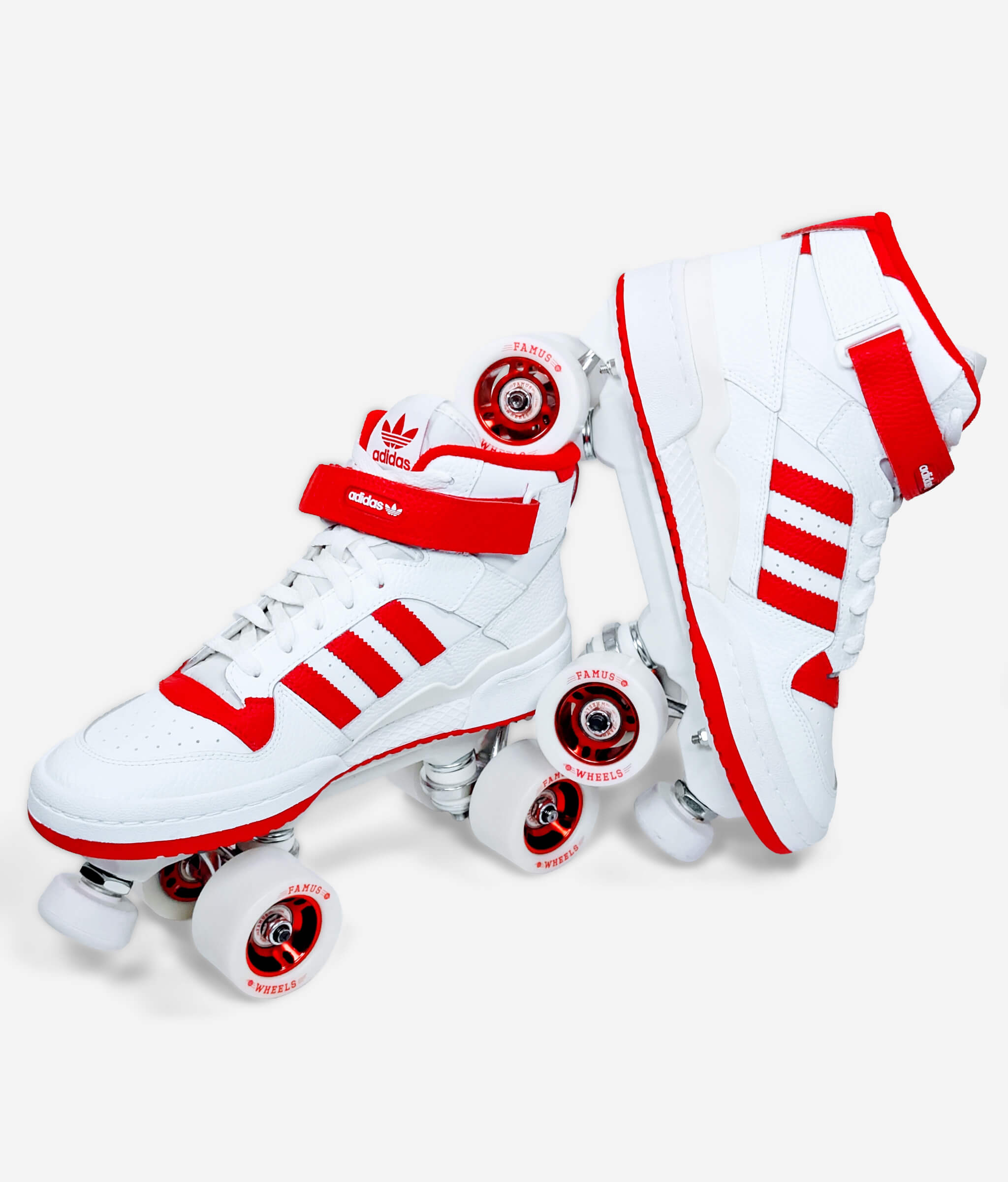 Loumy's Adidas Forum roller skate sneakers with one tilted roller skate balanced on the other, showing white and red components