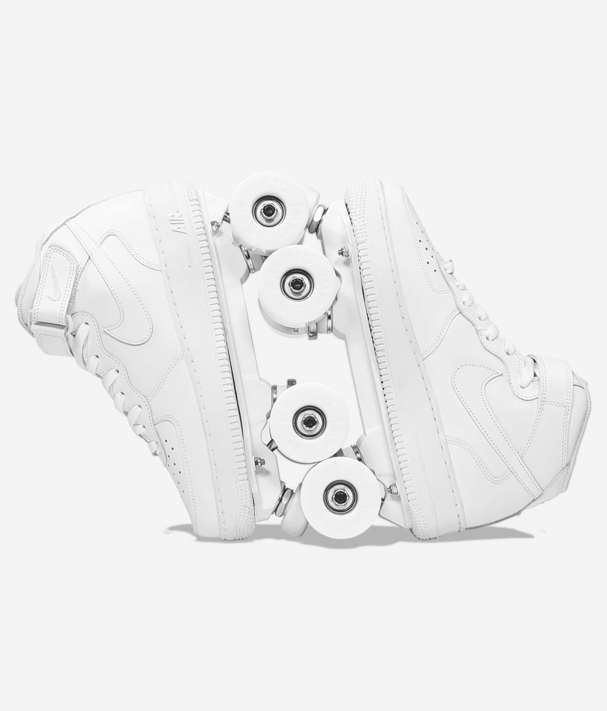 Loumy's Nike Air Force 1 Mid roller skate sneakers in white, displayed vertically with interlocked wheels