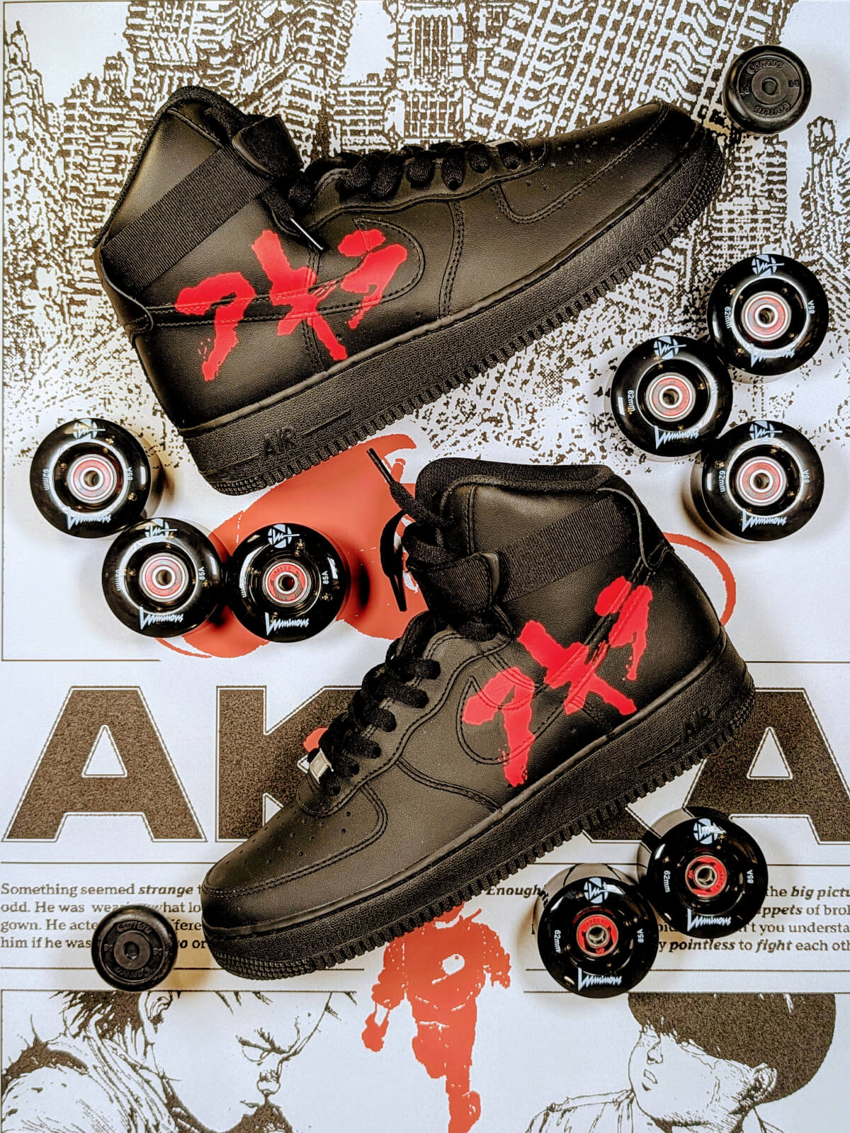 Pre-assembly view of black Nike Air Force 1 Mid sneakers by Loumy’s World with hand-painted red Akira lettering, detached roller skate wheels and an Akira movie poster