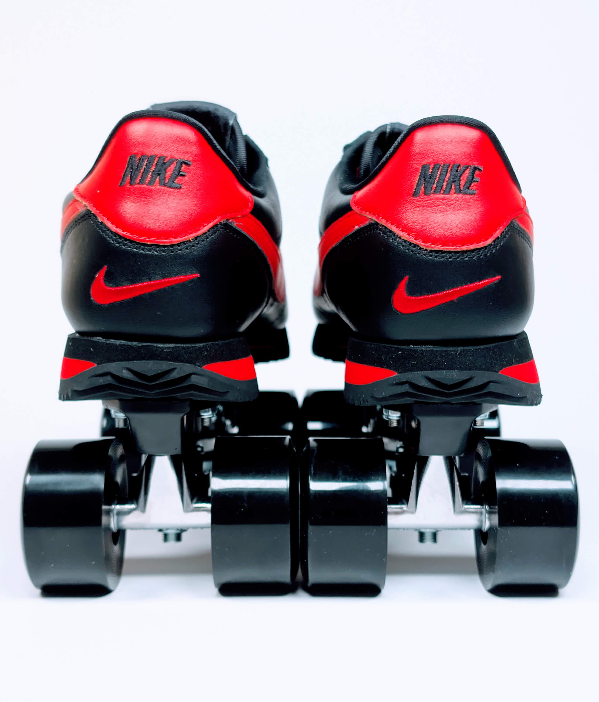 Rear view of handmade Nike Cortez roller sneakers by Loumy x Kazy