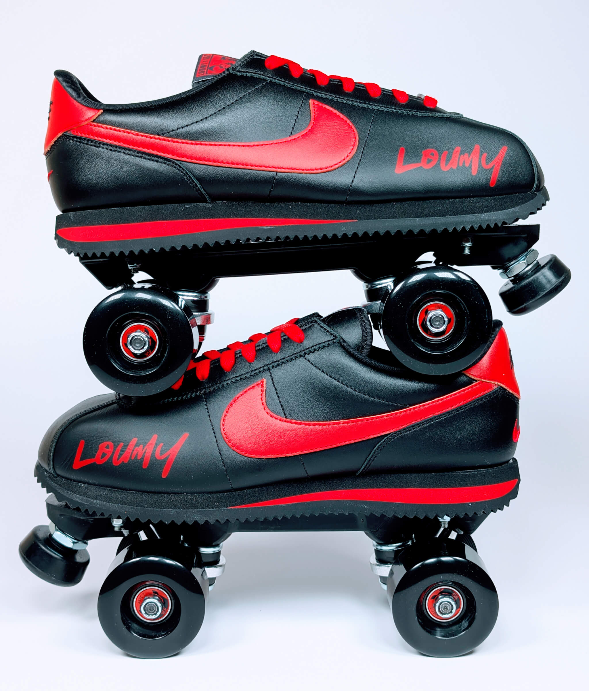Stacked custom roller sneakers built from Nike Cortez by Loumy x Kazy, black leather with bold red highlights and premium outdoor setup