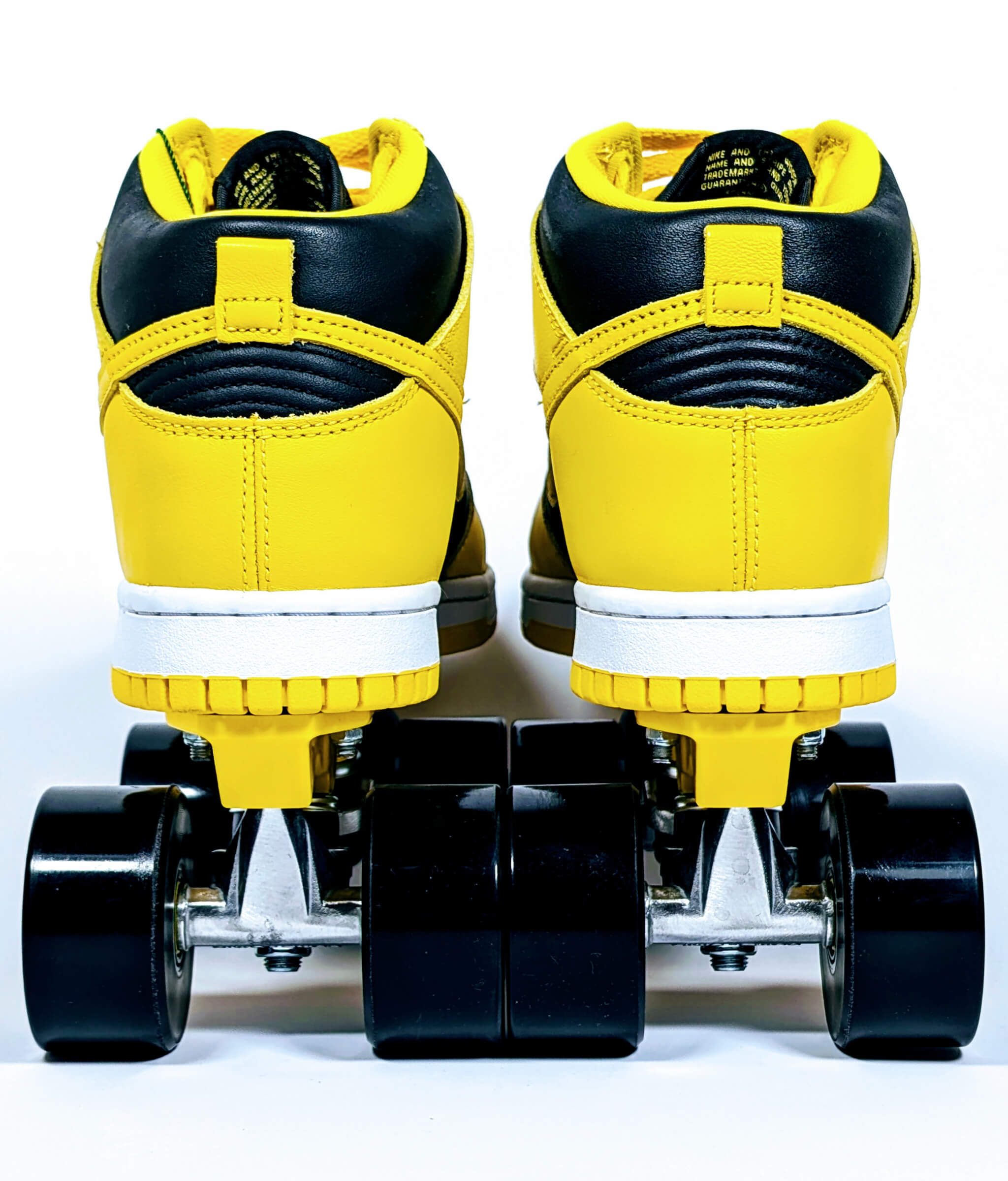 Back view of Loumy x Kazy's Nike Dunk Iowa Wu-Tang Clan roller sneakers in black and yellow