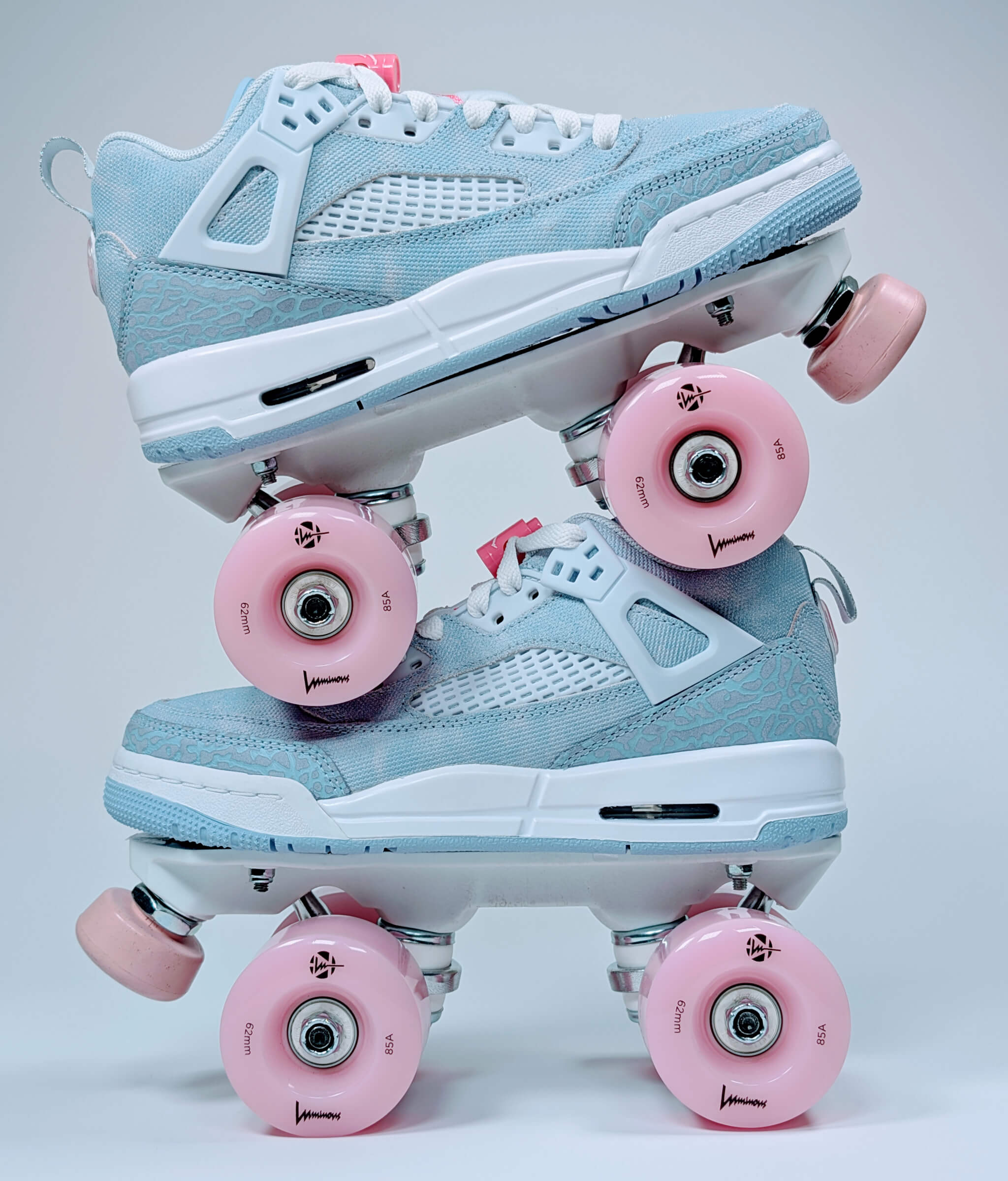 Side profile of Loumy's Nike Jordan Spizike roller sneakers stacked one over the other