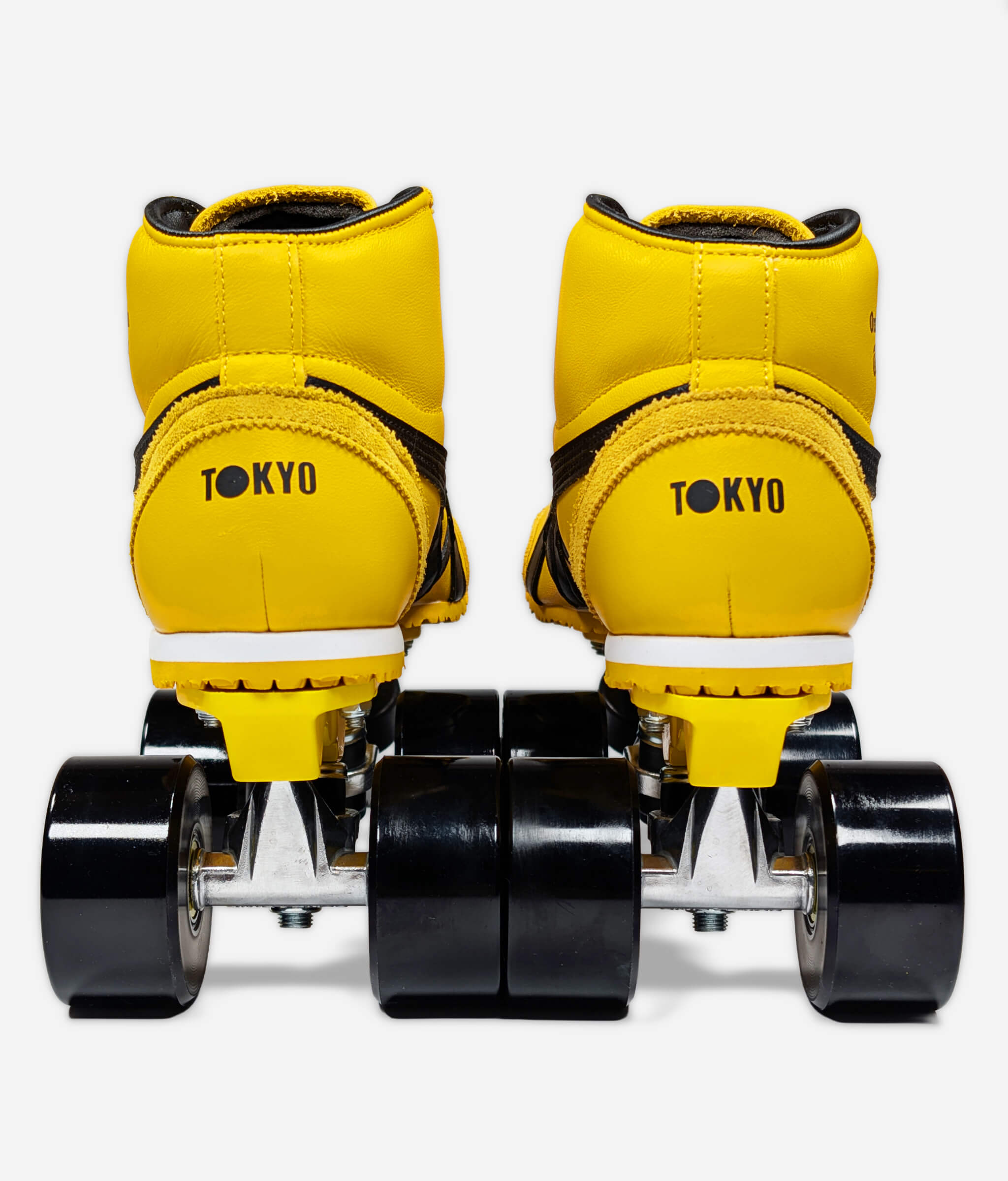 Back view of the black and yellow Onitsuka Tiger Mexico 66 Mid Runner roller skate sneakers by Loumy's World with black wheels and Tokyo logo visible