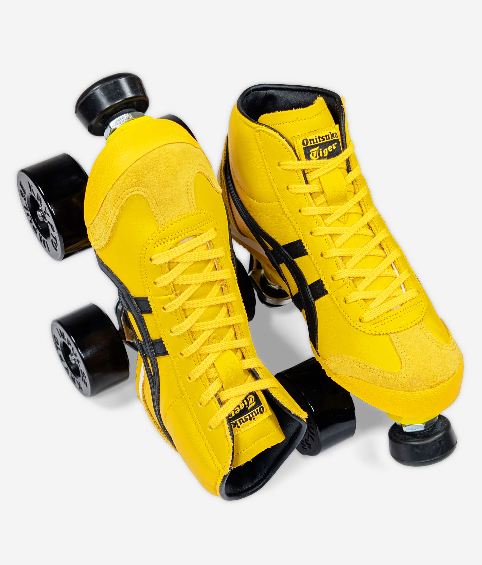 Onitsuka Tiger Mexico 66 Mid Runner roller skate sneakers by Loumy's World in yellow and black, one flat and one standing on the heel in side-by-side view
