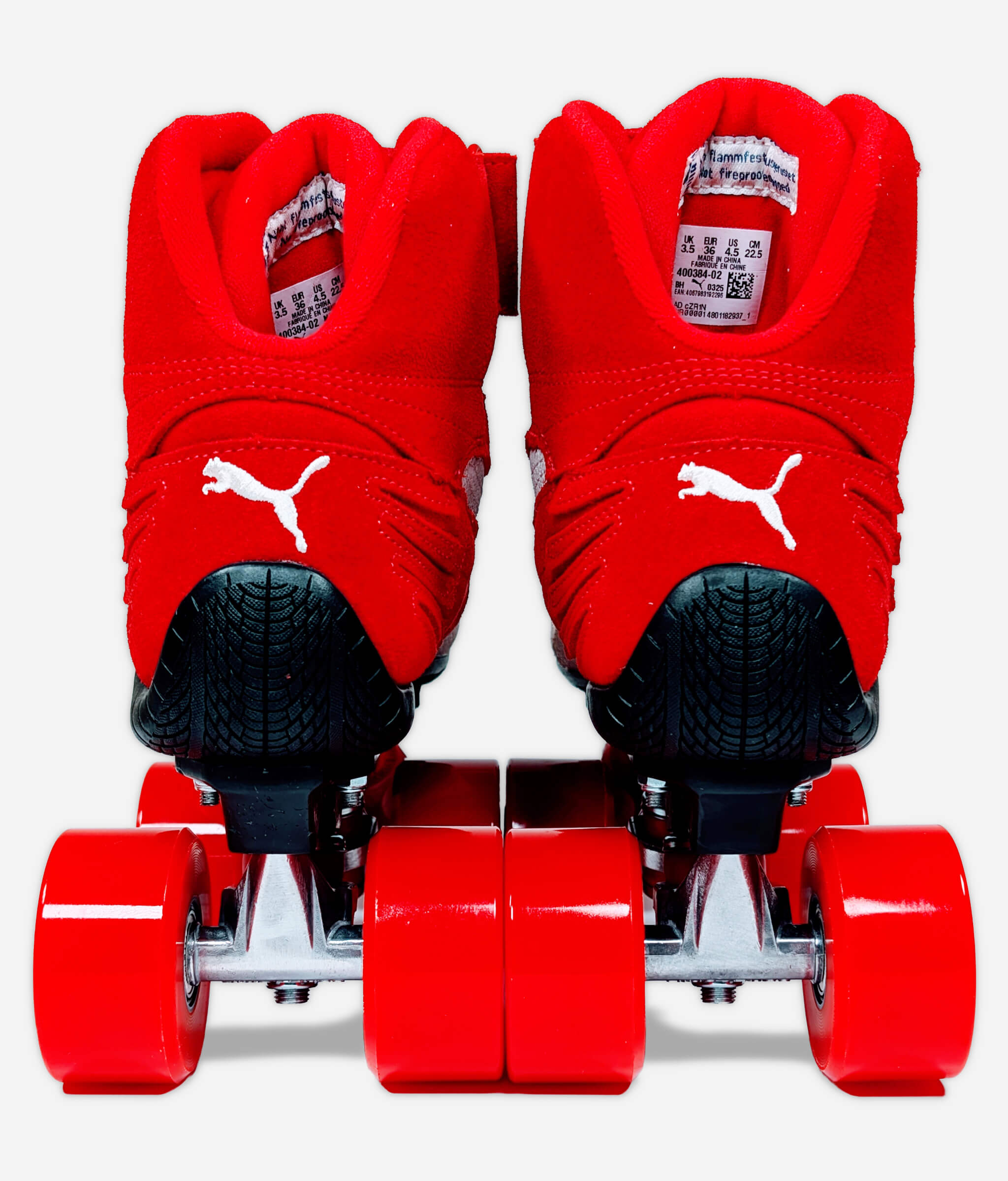 Back view of Loumy's Puma Speedcat Mid roller skate sneakers in red and black
