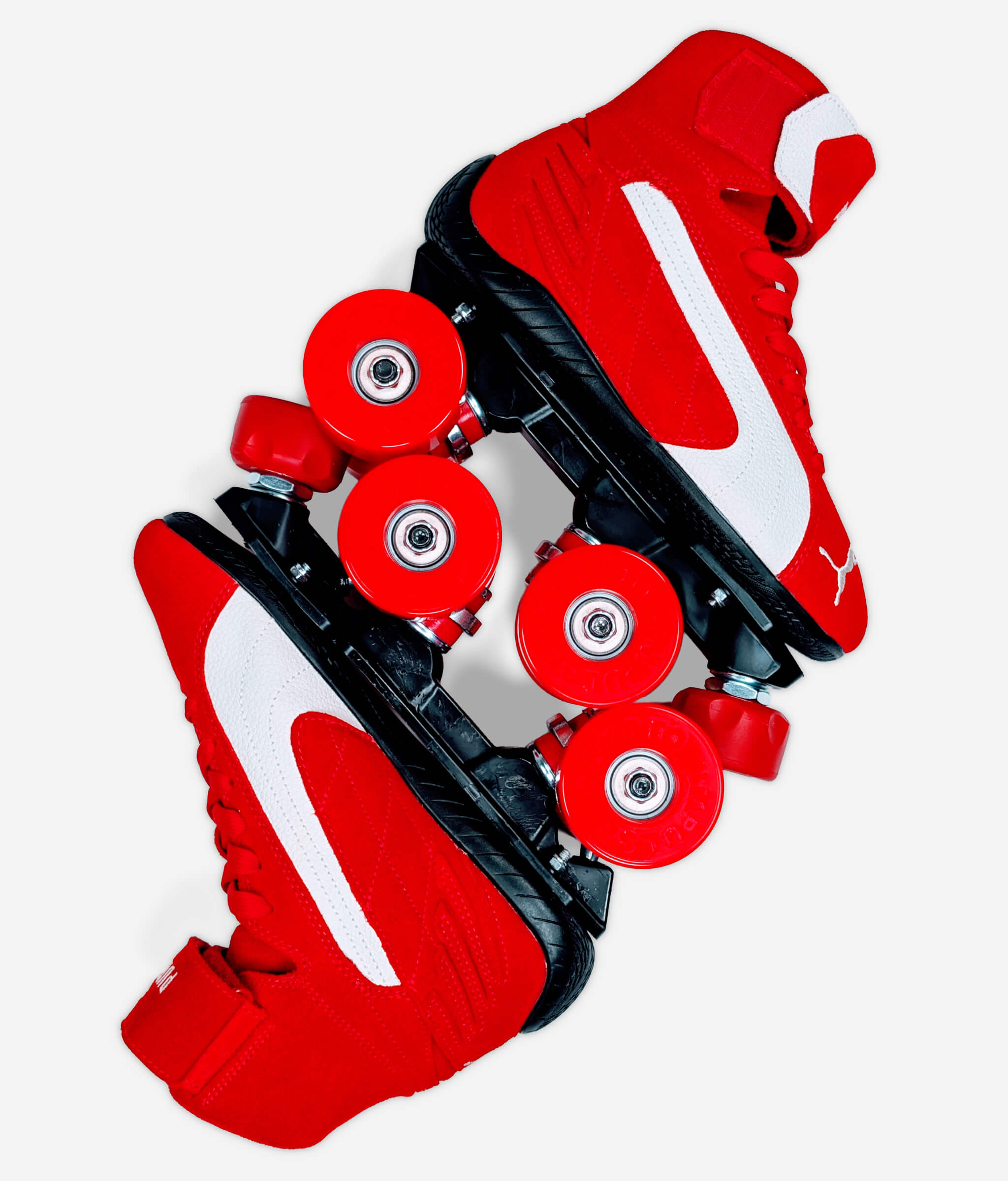Loumy’s Puma Speedcat Mid roller skate sneakers in red and black with interlocked wheels