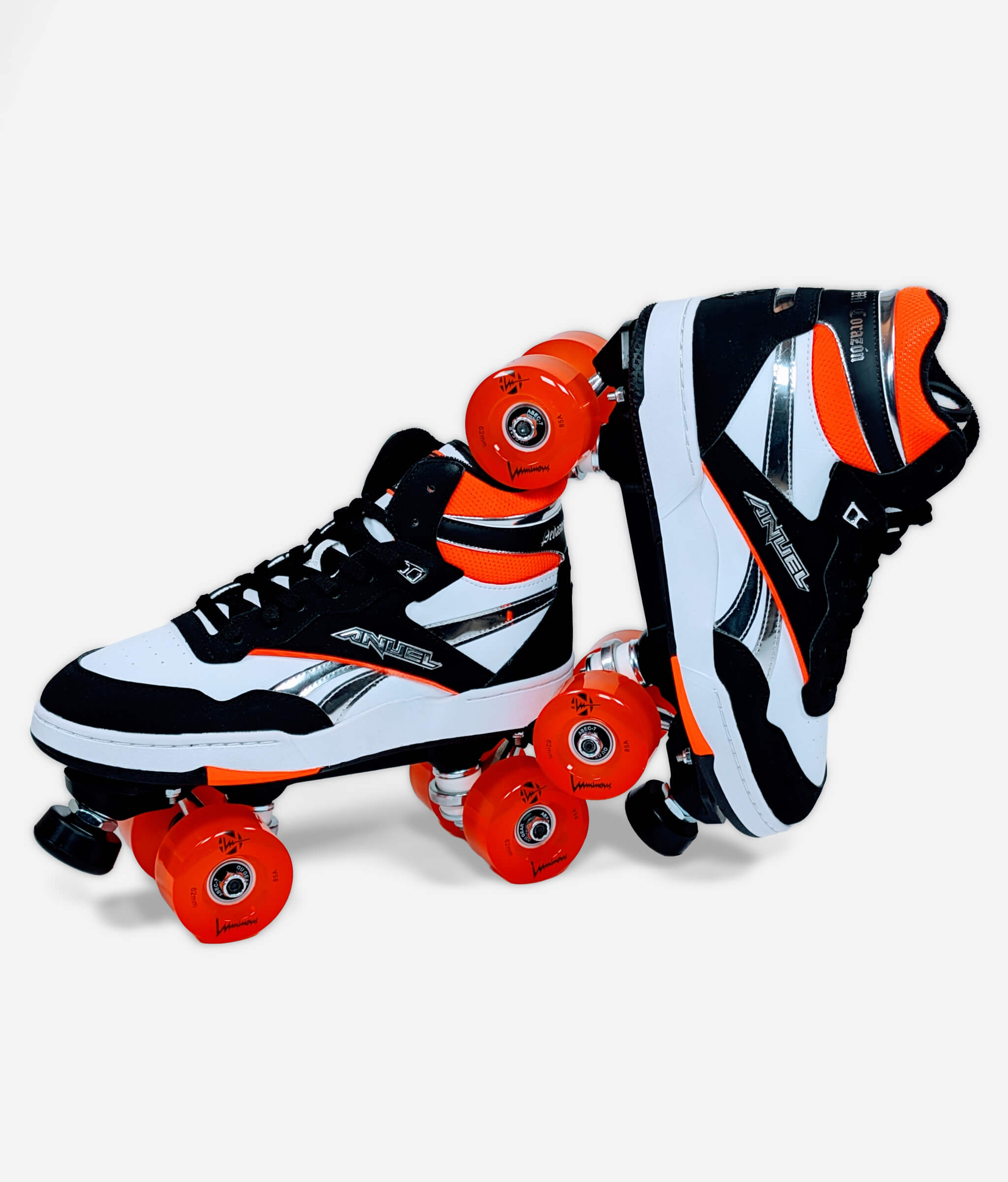 Loumy's Reebok x Anuel AA BB 4000 II Mid roller skate sneakers with one tilted roller skate balanced on the other, showing orange and black components